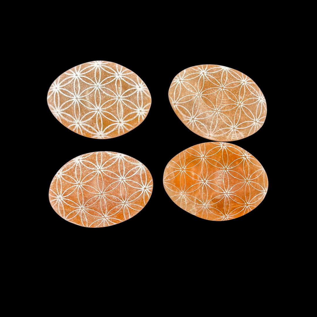 Peach Selenite Engraved Palmstone - Flower Of Life